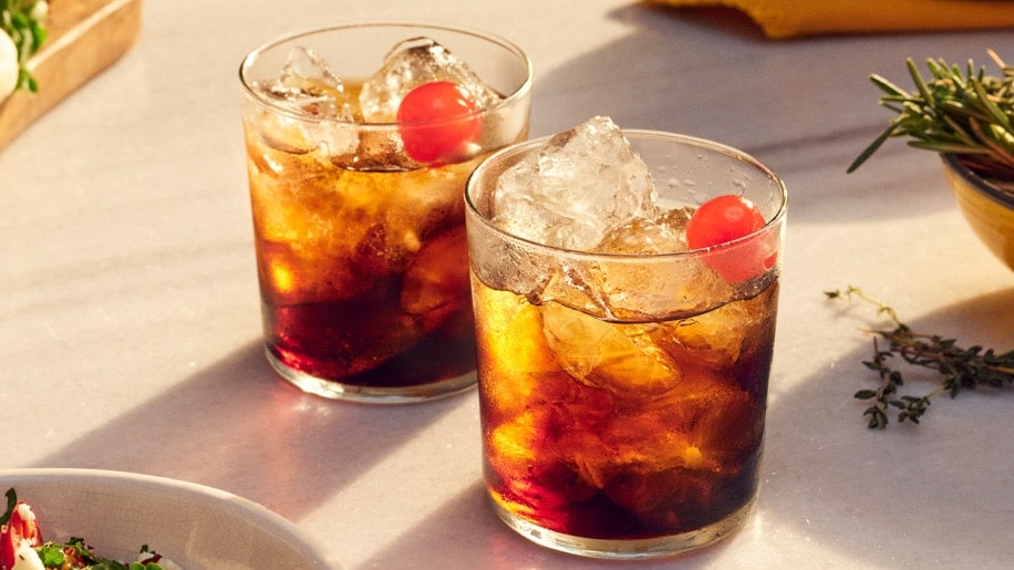 Two Black Russian cocktails on a table